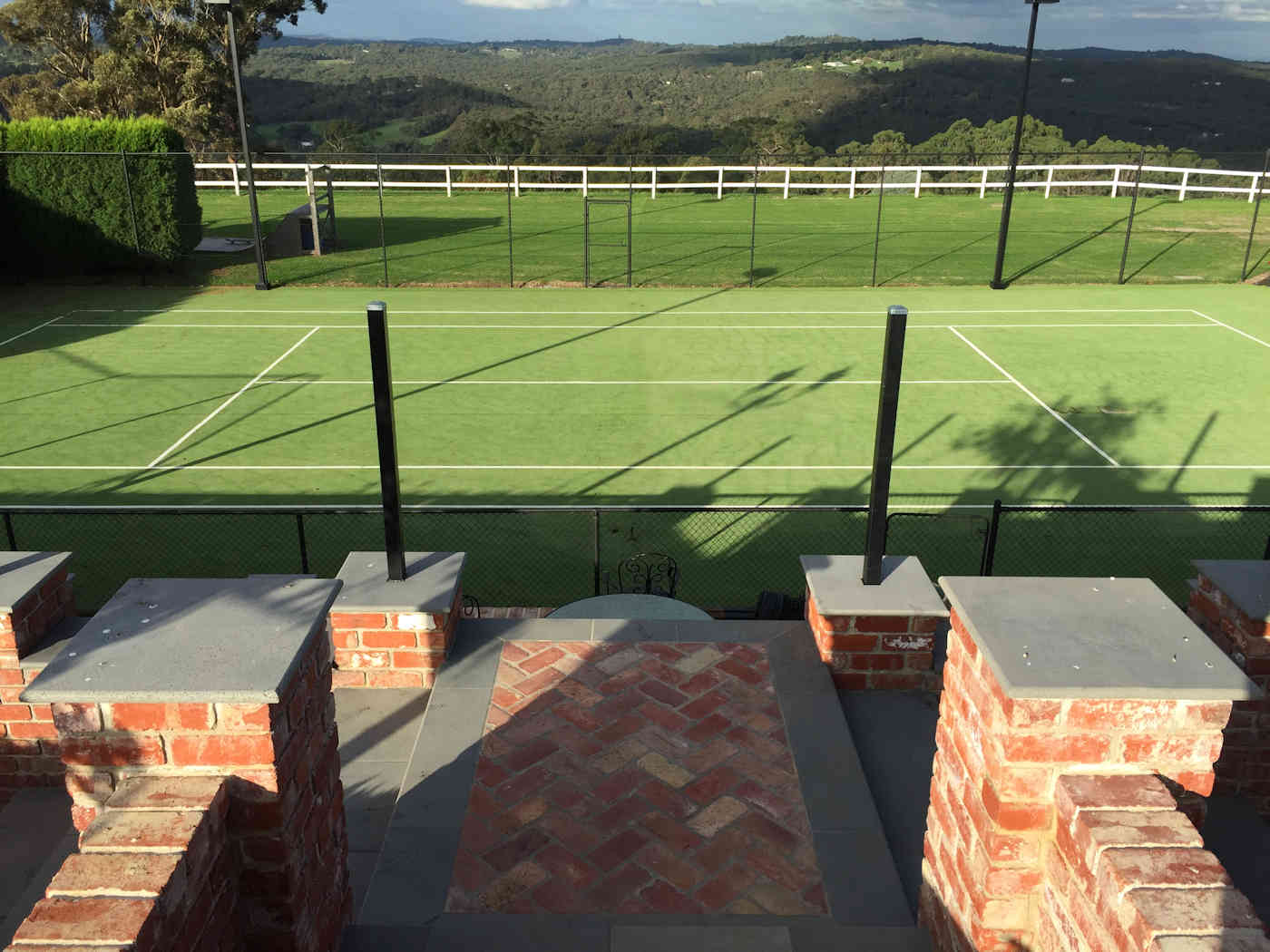 synthetic grass tennis court builder