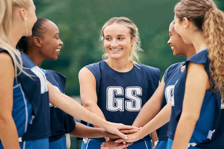 Netball team huddle Netball team huddle